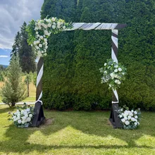 Arch styling — flowers & drapery — Lakeside Tent Co, Kelowna