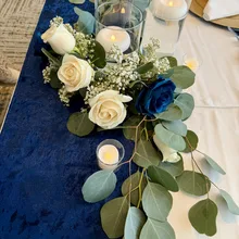 Table centerpiece — 3 jars, 3 candles + 5 real flower stems, eucalyptus & baby's breath — Lakeside Tent Co, Kelowna